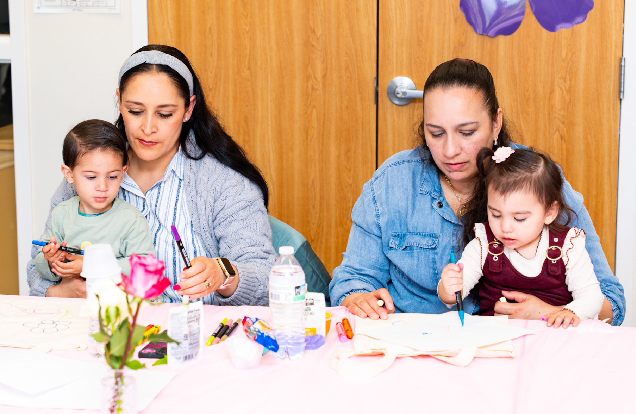 El Valor children celebrating mother's day with their mothers